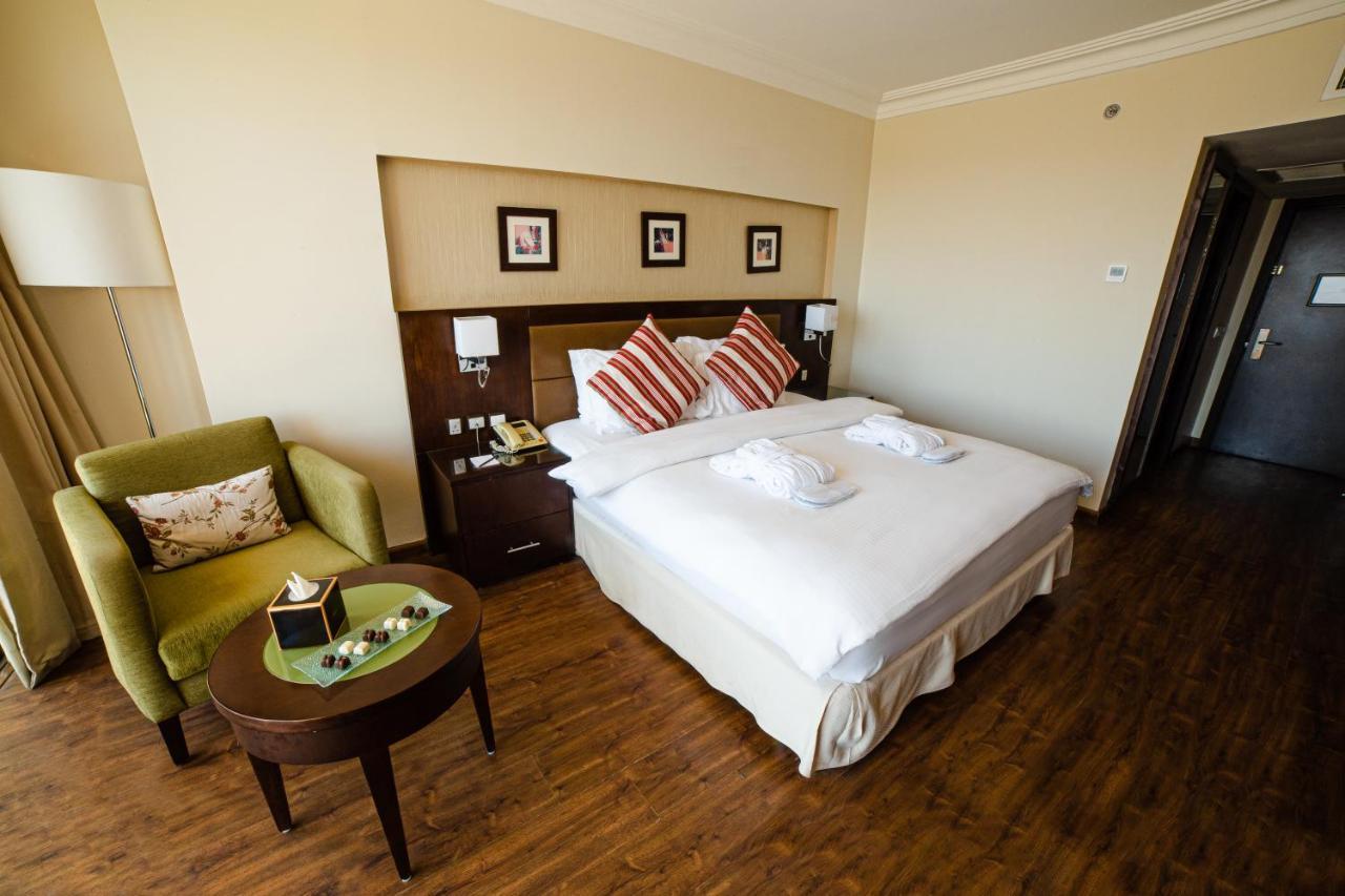 Oryx Hotel Akaba Kültér fotó A bedroom at the hotel