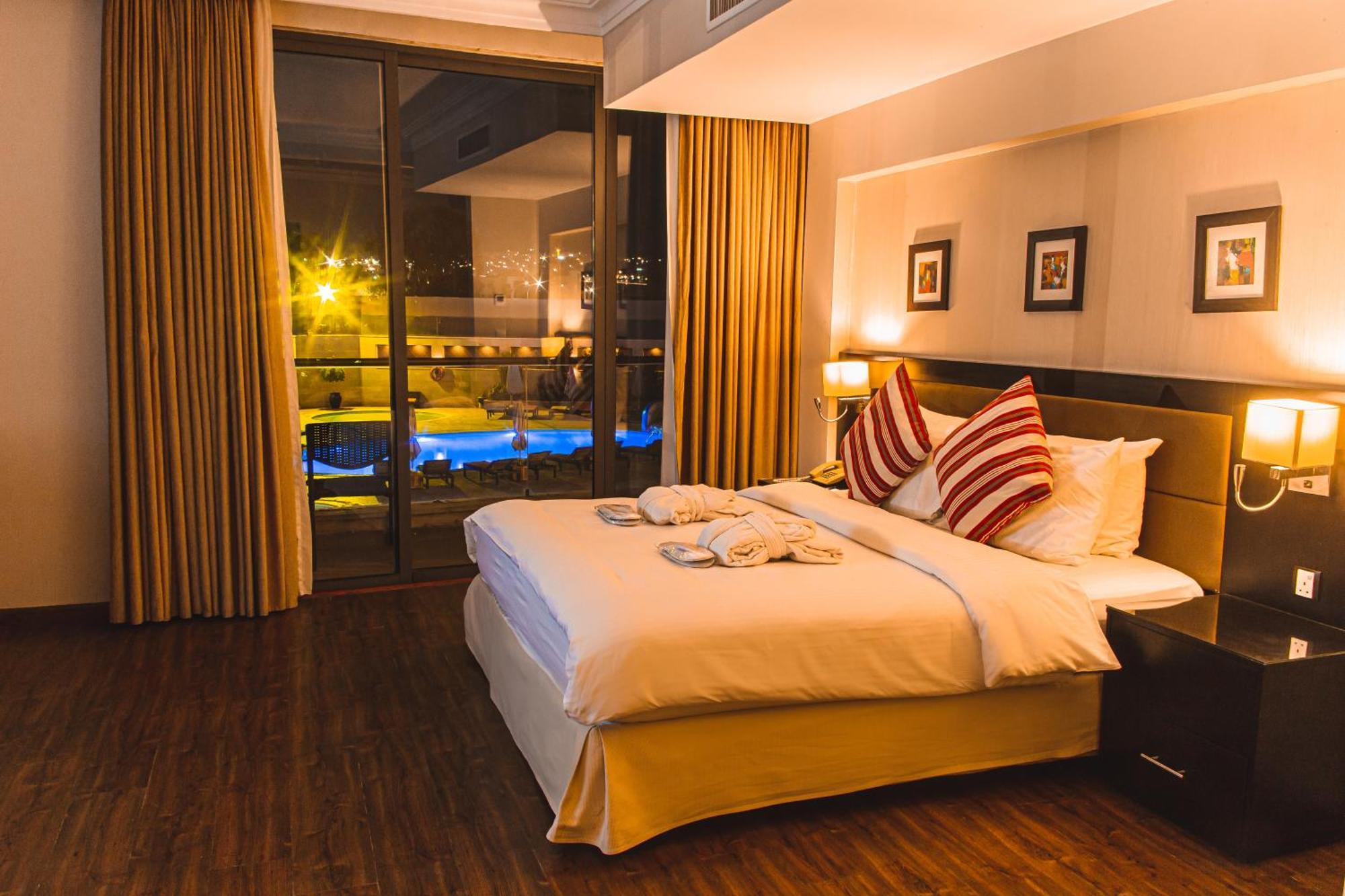 Oryx Hotel Akaba Kültér fotó A bedroom at the hotel