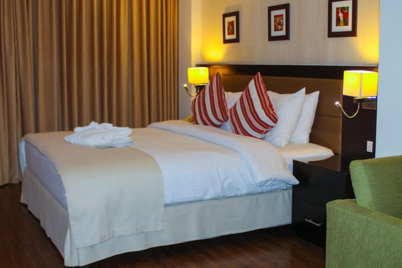 Oryx Hotel Akaba Kültér fotó A bedroom at the hotel