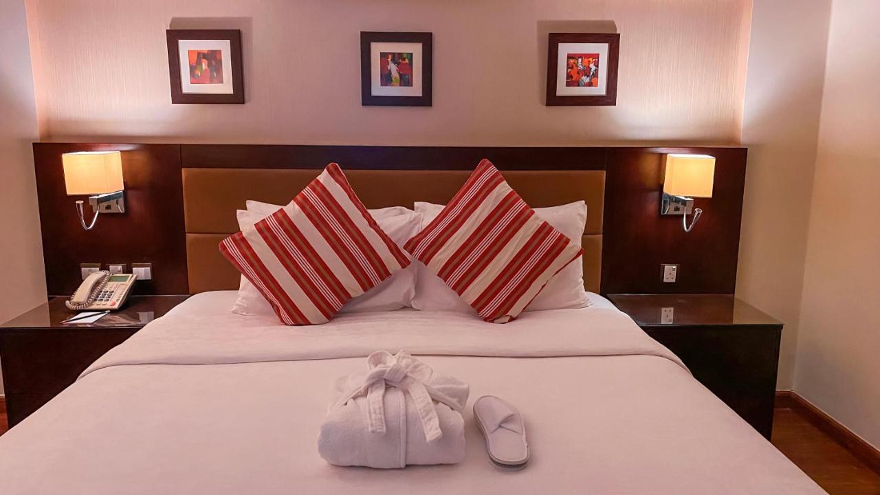 Oryx Hotel Akaba Kültér fotó A bed with a duvet