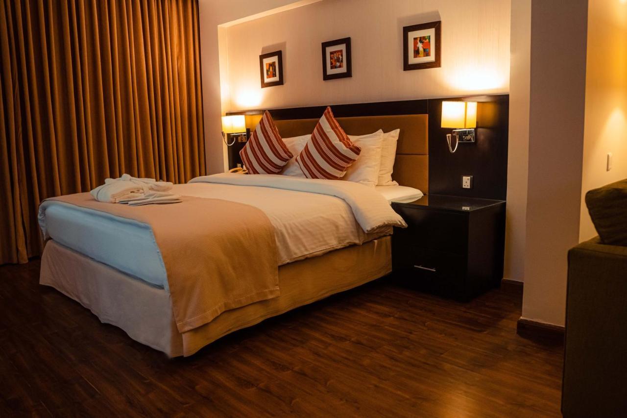 Oryx Hotel Akaba Kültér fotó A bedroom at the hotel
