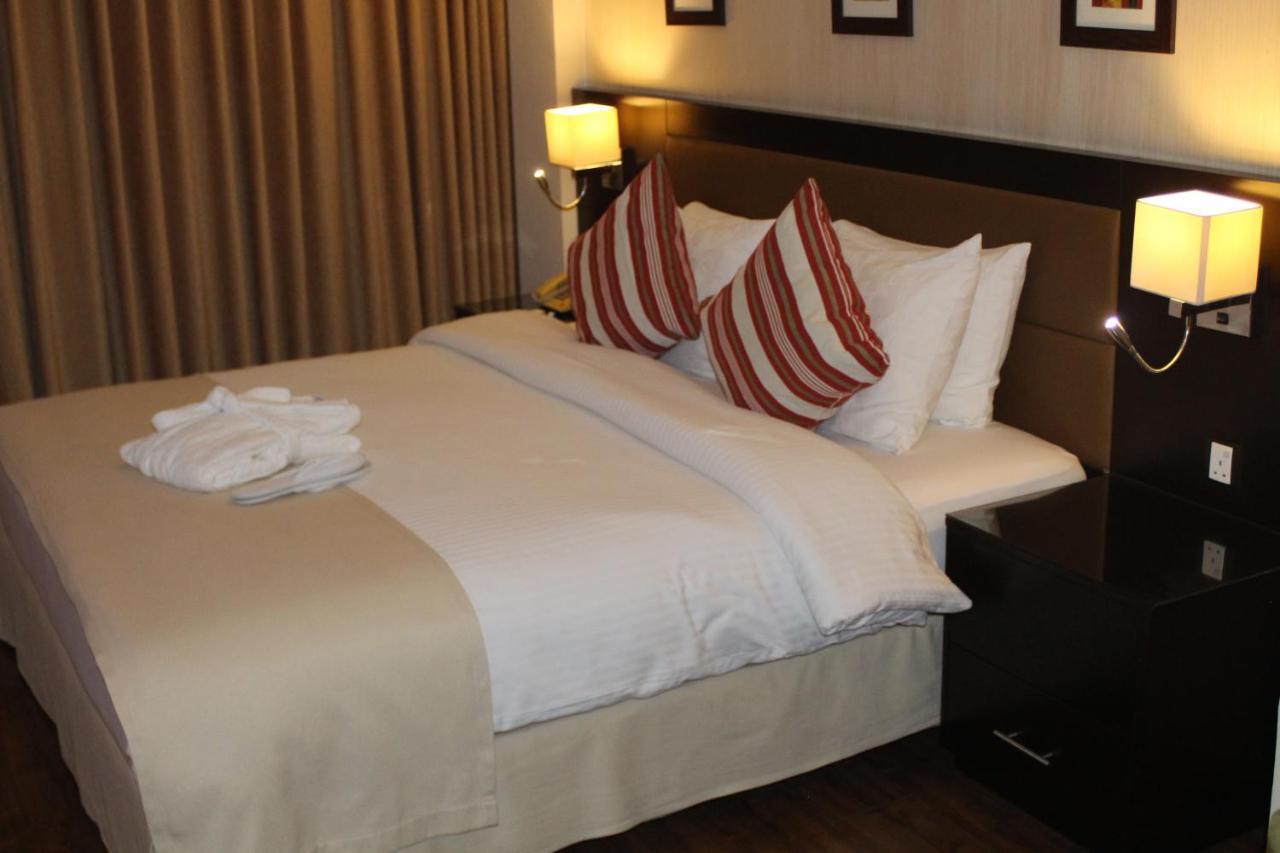Oryx Hotel Akaba Kültér fotó A bed