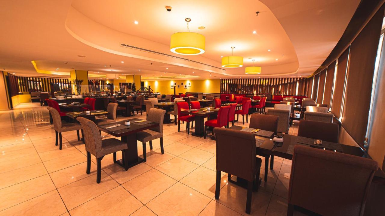 Oryx Hotel Akaba Kültér fotó The interior of a typical buffet restaurant